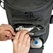 two exterior zippered pockets holding spigots blocking plugs and primers